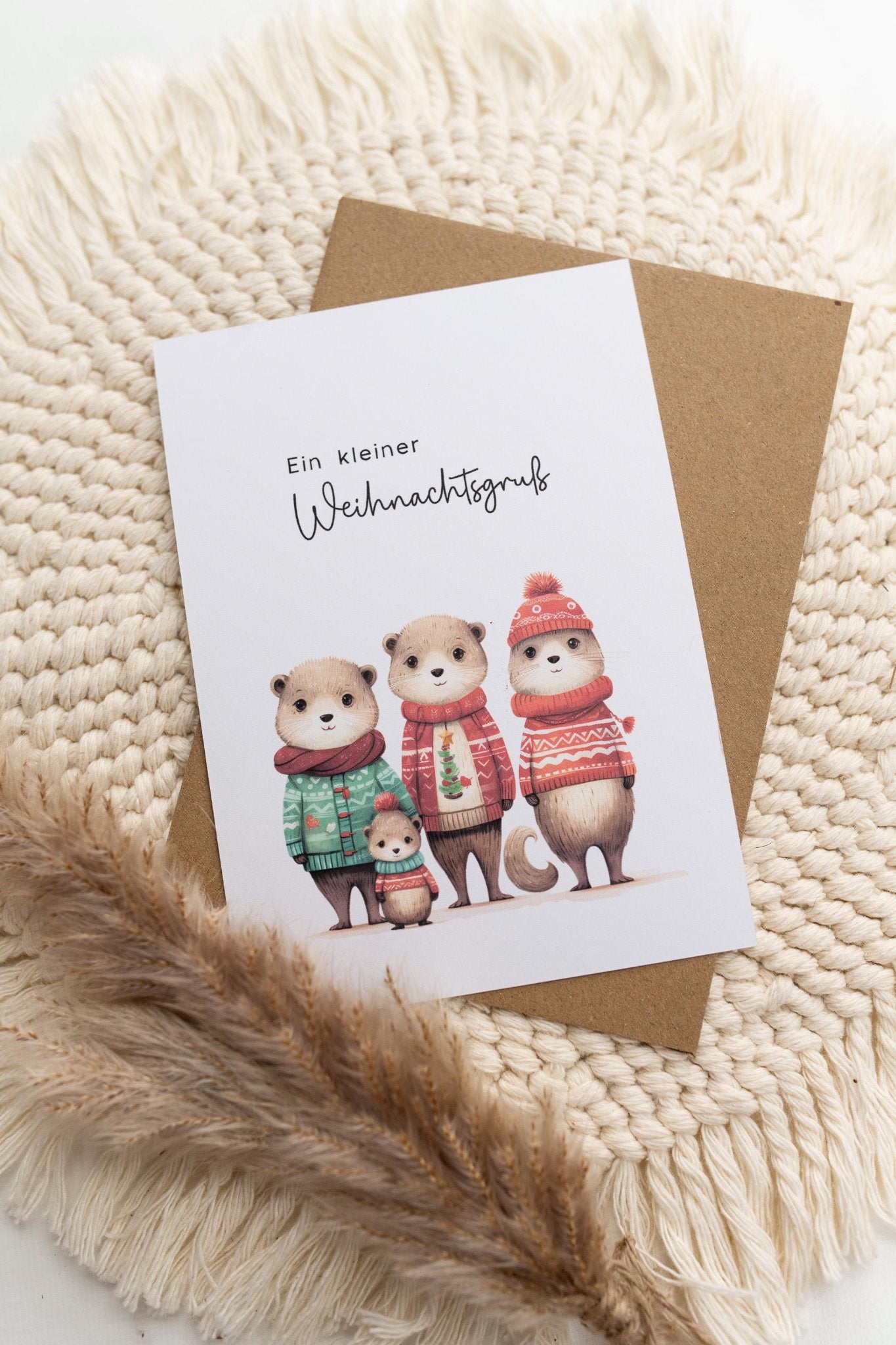 Weihnachtskarte - Otter Familie